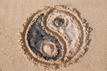 Ying Yang symbol drawn on the beach