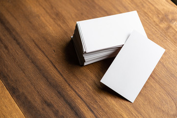 Business cards blank mockup on wooden background