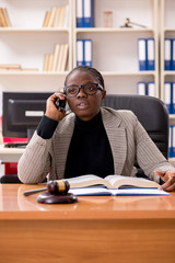 Black female lawyer in courthouse 