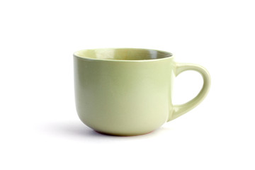 Green cup isolated on white