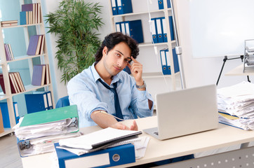 Young male employee in blood transfusion concept