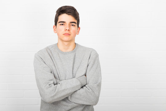 portrait of young isolated in white wall
