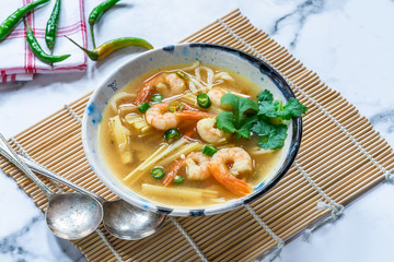 Tom yum - hot and sour Thai soup with prawns