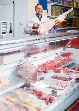 Portrait Of Male Butcher In Kosher Section At Supermarket