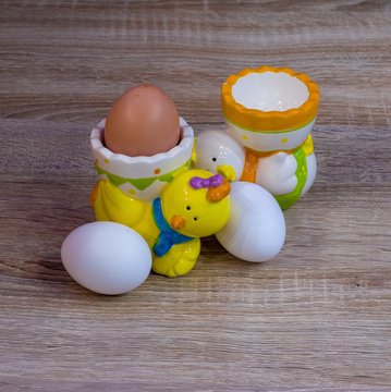 Two egg holders and three eggs for Breakfast