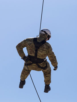 Special Forces descend on a rope