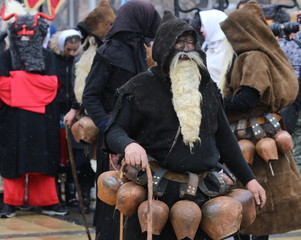 Pernik, Bulgaria - January 27, 2019 - Masquerade festival Surva in Pernik, Bulgaria. People with mask called Kukeri dance and perform to scare the evil spirits.