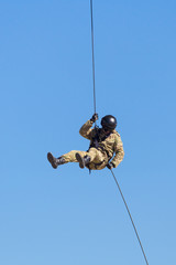 Special Forces descend on a rope