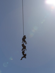 Special Forces descend on a rope