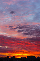 Sunset sky over night cityscape