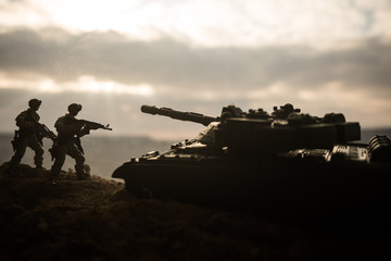 War Concept. Military silhouettes fighting scene on war fog sky background, World War Soldiers...