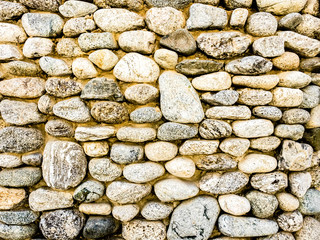 Rough old wall background, part of stone masonry
