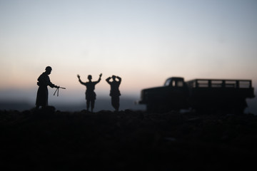 War Concept. Military silhouettes fighting scene on war fog sky background, World War Soldiers Silhouettes Below Cloudy Skyline At night. Attack scene. Armored vehicles. Tanks battle. Decoration