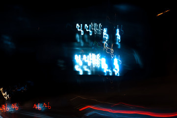 Long exposure road photo at night with shaky lights.