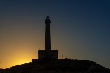 Sunrise and a lighthouse