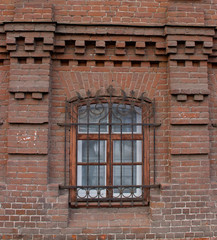 Fototapeta na wymiar Vintage Windows in a brick house.
