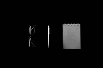 business accessories on black background