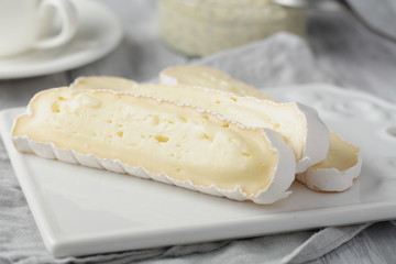 Healthy breakfast with brie cheese and pudding