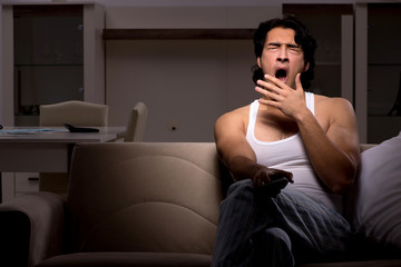 Young man suffering at home night time 