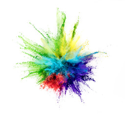 Multi colored powder explosion isolated on white