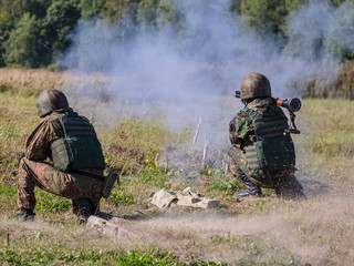 A soldier shoots an RPG-7