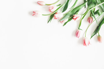 Flowers composition. Pink tulip flowers on white background. Valentines day, mothers day, womens day, spring, easter concept. Flat lay, top view, copy space