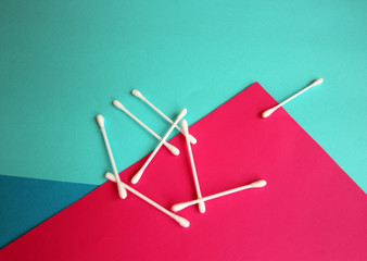 cotton buds cosmetics blue background