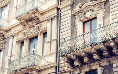 Beautiful cityscape of Italy, facade of ancient house in sicilian baroque style on historical...
