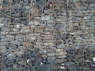 Fence of gray stones, background