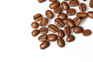 Roasted coffee beans isolated on white can be used as background or texture. Close up.
