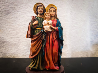 Fototapeta na wymiar Toy figures of baby Jesus with mother virgin Mary and father Joseph