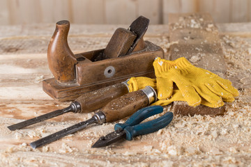Carpenter tools. on wooden background stand tools.