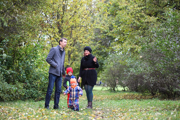 Young family with children on a walk