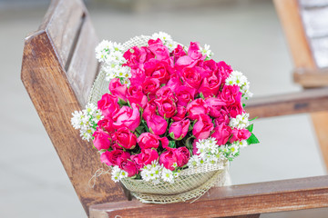 Wallpaper of flowers (roses) that are placed on chairs or wooden tables, to be displayed at festivals or on special occasions (Valentine, wedding, birthday, new year) 