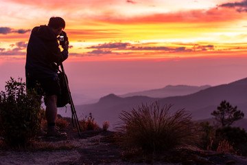 Sunrise viewpoint photographer On the high mountain, Thailand