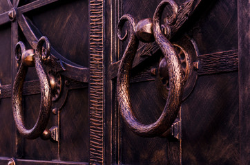 Round handles of a beautiful metal gate