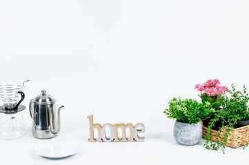 Tidy flowers or fruits and various kitchen tools on the white background.