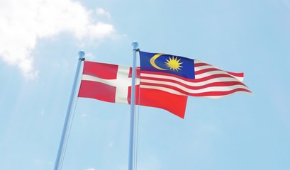 Malaysia and Denmark, two flags waving against blue sky. 3d image