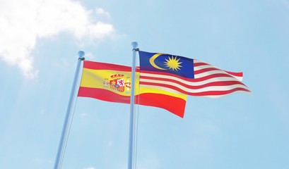 Malaysia and Spain, two flags waving against blue sky. 3d image