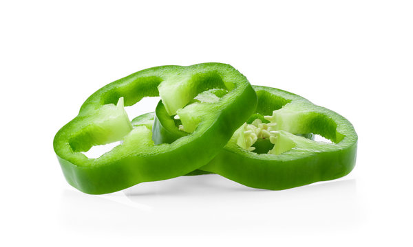 sliced green bell pepper isolated on white background