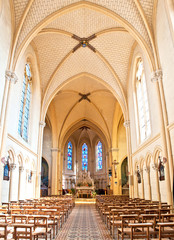 Fototapeta premium Architectural details of a small church in a town of Neuvy-en-Mauges