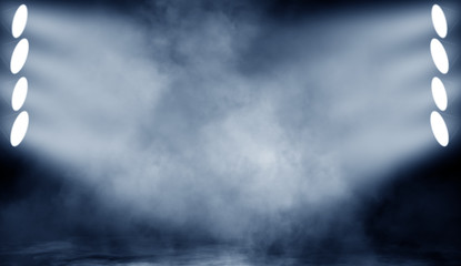 Fototapeta premium Blue stage . Spotlights on the floor. Isolated on black background.