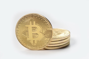 Golden Bitcoins. New virtual money. Studio shot