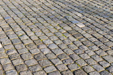 cobble stones on the ground in the city 