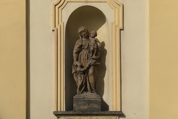Fototapeta na wymiar Sculpture of the immaculate virgin Mary in the town of Zatec Czech Republic