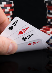 the player looks at his cards and sees the victory in poker