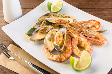 Shrimps and mussels in a creamy sauce, ready-made dish, Asian cuisine, seafood, menu, restaurant