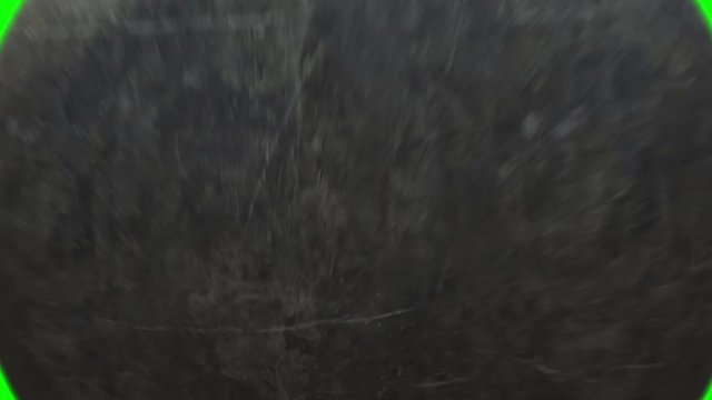 4K. Metallic Wrecking Ball Shattering The Concrete Wall. Front View. Green Screen. 3D Animation.