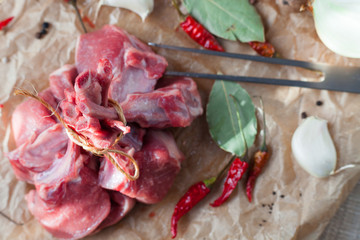 Raw Irish lamb chop and Racks of lamb ready for cooking, on a paper. Soft focus and background.