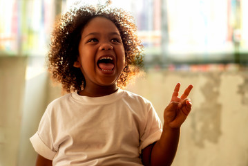 Happy cute  african little girl smiling